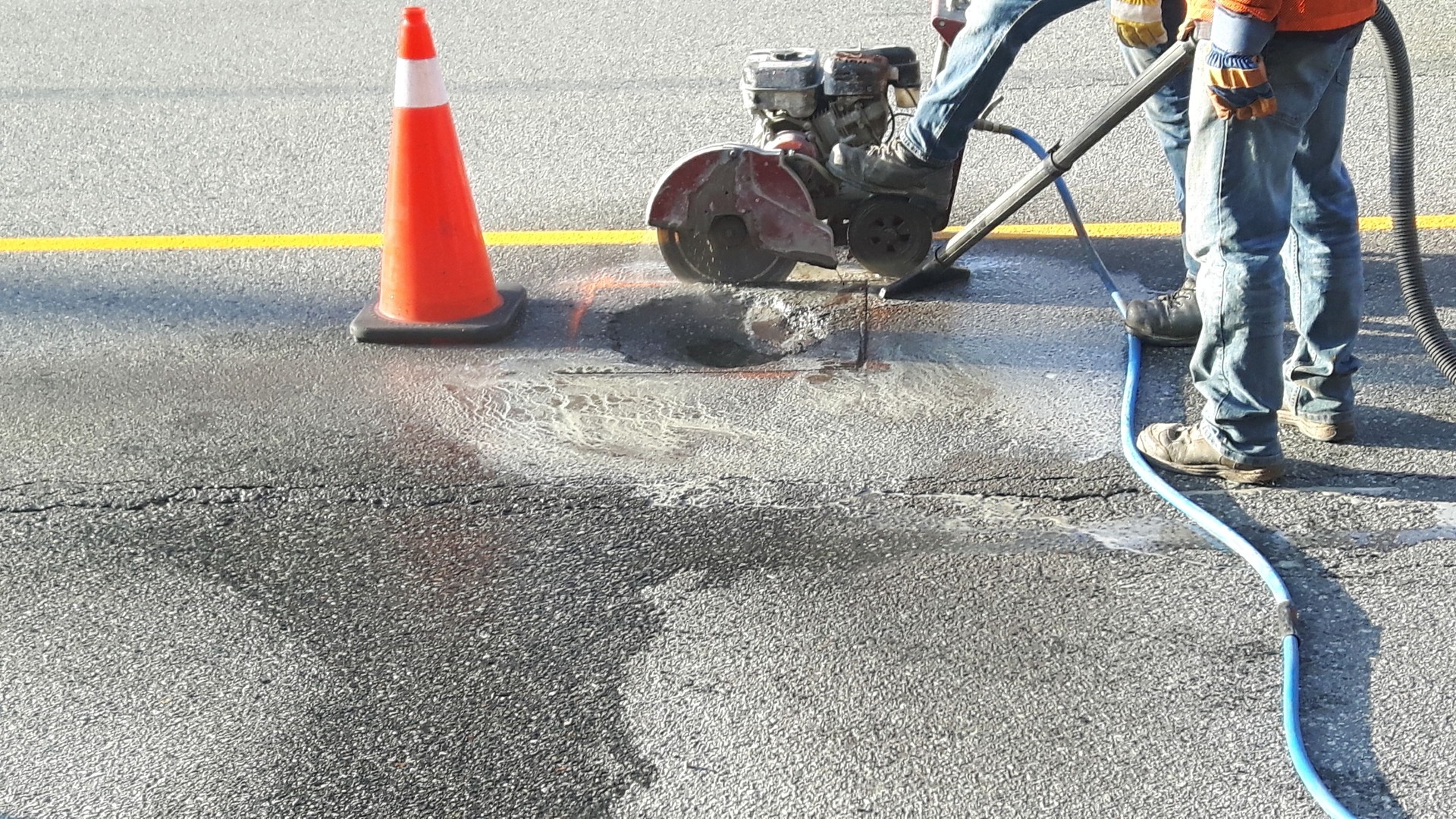 Workers repairing road